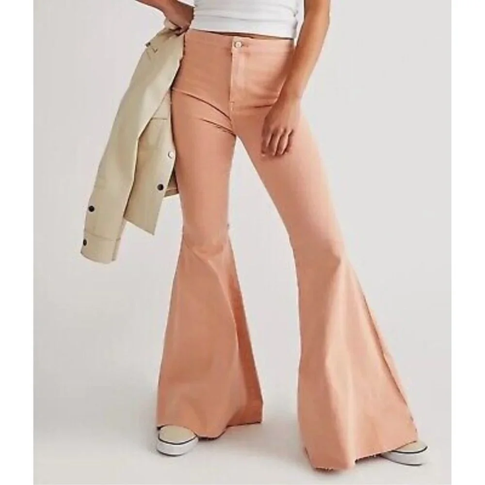 Free People Women's Pink Float‎ On Flared Leg Denim Jeans Raw Hem Size W25